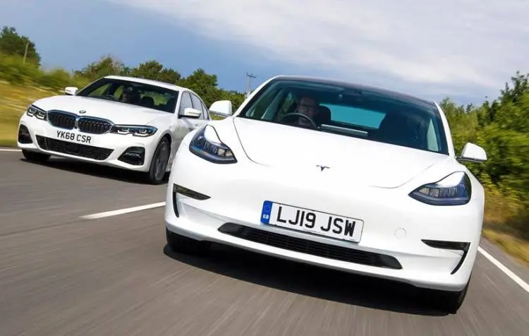 tesla-vs-bmw.jpg