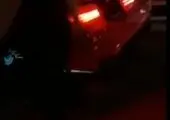 فیلمی از له شدن یک خودرو زیر ۲ تریلی 