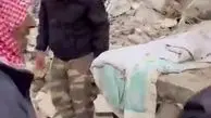 لحظه بیرون کشیدن یک نوزاد از زیر آوارهای حلب + فیلم