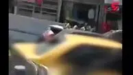 قمه کشی زن ابهری برای یک تاکسی! / فیلم